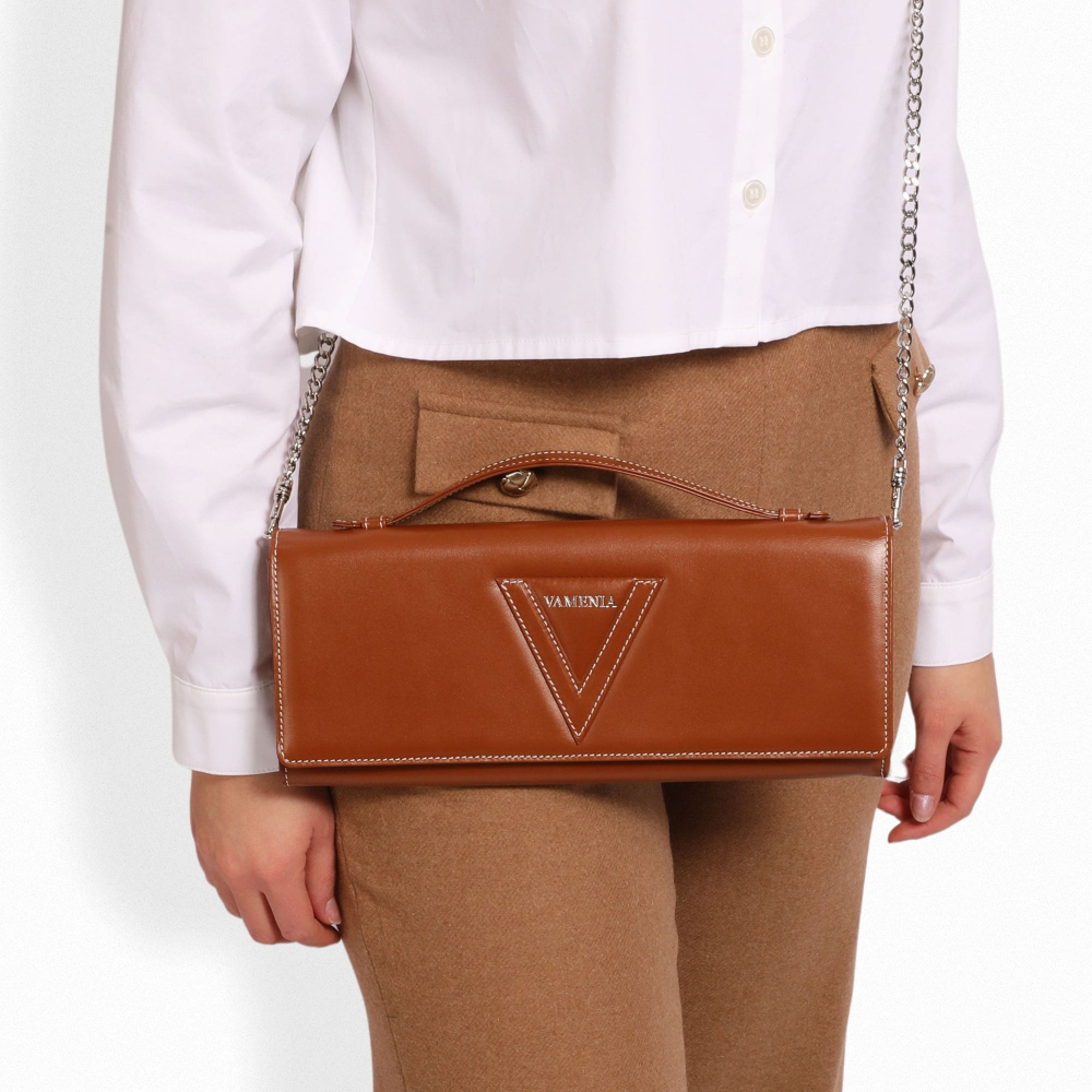 Long clutch made of calf leather in cognac